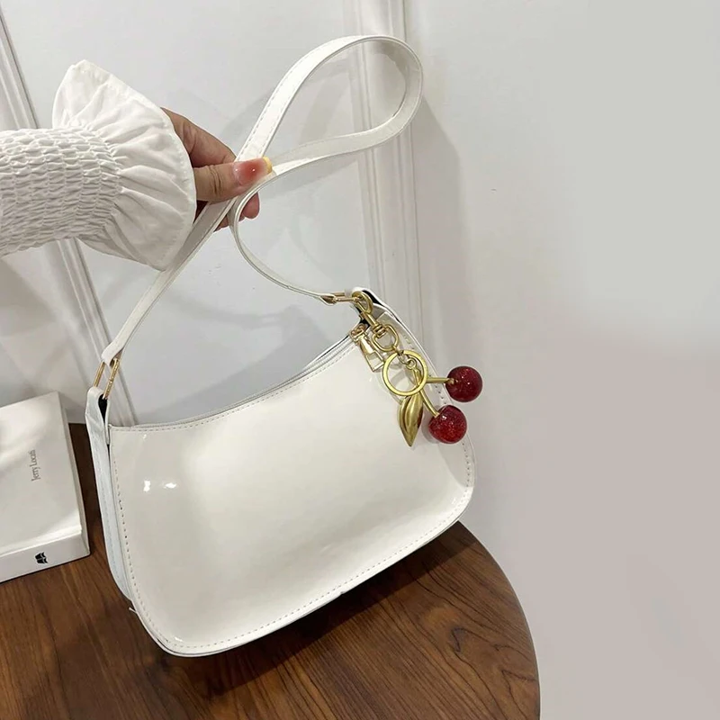 women's pu leather handbag versatile fashion solid color cherry pendant shoulder bag casual commuting bag girl underarm bag women's pu leather handbag versatile fashion solid color cherry pendant shoulder bag casual commuting bag girl underarm bag